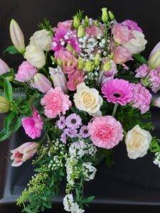 hand tied floral bouquet with vase