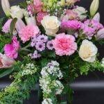 Hand tied flower bouquet with vase